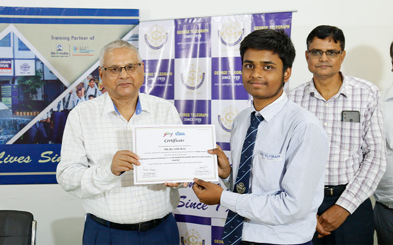 Student receiving certificate